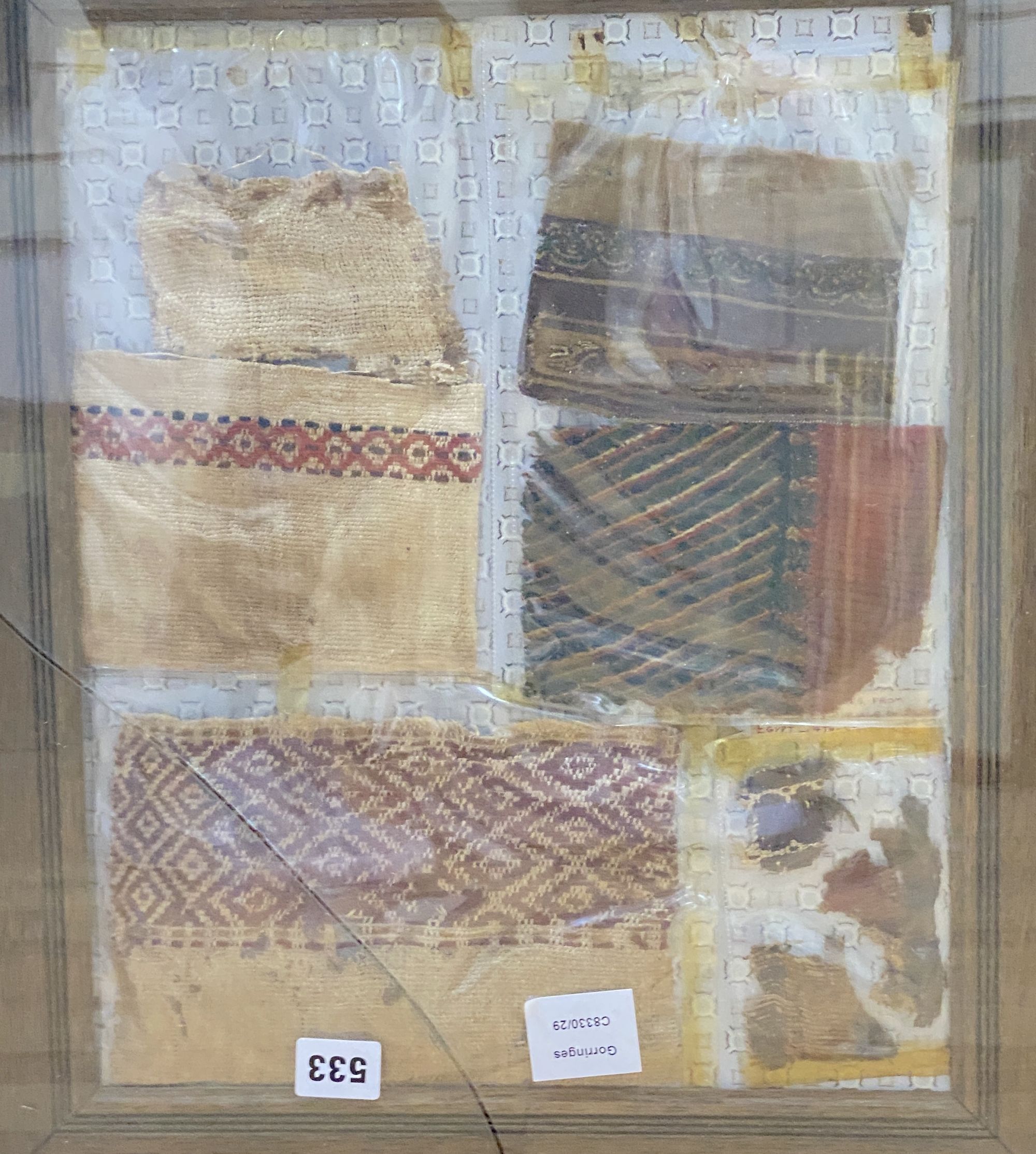 A framed group of textile fragments, from Christian burials in Egypt 4th-5th century